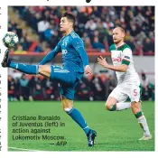  ?? — AFP ?? Cristiano Ronaldo of Juventus (left) in action against Lokomotiv Moscow.