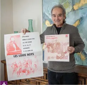  ?? Photo : Marta Guerrero ?? Edwin Prince, fondateur des Louis Boys, tient ici l’une des affiches originale de 1972, annonçant le premier spectacle du groupe.