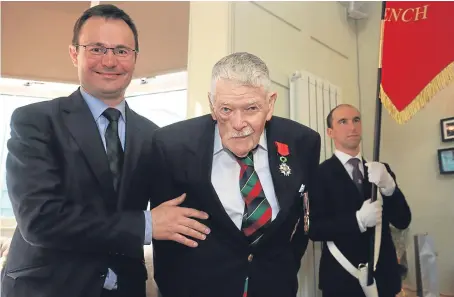  ?? Picture: Phil Hannah. ?? French Consul General Emmanuel Cocher, left, awarded the Legion d’honneur to Second World War veteran Duncan Foster in Kinross yesterday.