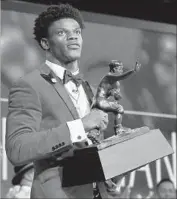  ?? Getty Images ?? SOPHOMORE Lamar Jackson is the youngest Heisman Trophy recipient ever at 19 years 337 days.