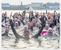  ??  ?? SPLASHDOWN Ross did last mile with 300 other swimmers