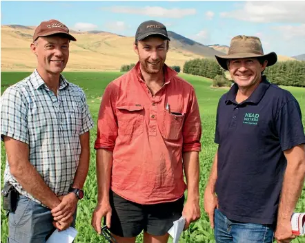  ??  ?? Simon Saunders, left, and Allen Gregory of Stag Valley chat with Headwaters breeding programme manager Andrew Bendall. PHOTO: DIANE BISHOP