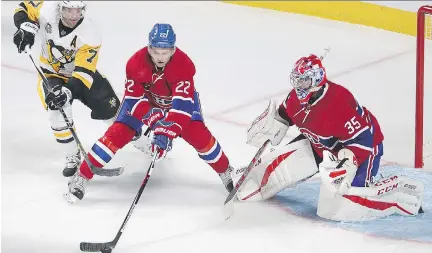  ?? PIERRE OBENDRAUF ?? Habs defenceman Mikhail Sergachev clears the puck away from prowling Pittsburgh centre Matt Cullen in front of goalie Al Montoya on Tuesday night. Sergachev received limited ice time in Tuesday’s 4-0 win over the Pens, but he’s impressing the...