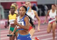  ?? David J. Phillip / Associated Press ?? Allyson Felix, of the United States, runs in the women’s 4x400-meter relay at the 2020 Summer Olympics on Saturday in Tokyo.