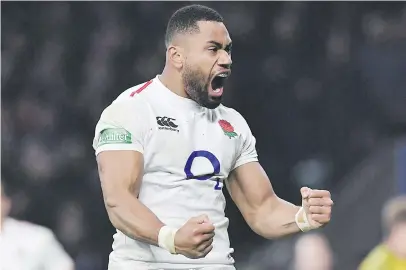  ?? Picture: AFP ?? WORLD CUP PROMISE. England wing Joe Cokanasiga celebrates after scoring a try during their Test against Australia at Twickenham on Saturday.