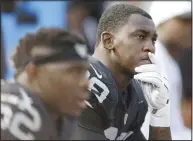  ??  ?? In this Sept. 13, 2015, file photo, Oakland Raiders linebacker Aldon Smith (99) sits on the bench during the second half of the team’s NFL football game against the Cincinnati Bengals in
Oakland, California. (AP)