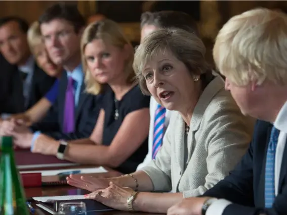  ?? (AFP/Getty) ?? The PM has slapped down Boris Johnson (right) and other senior Brexiteers for going off-piste with remarks on the single market