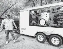  ??  ?? Flores spent the past year building his new barbecue trailer. He plans to make it a full-time business.