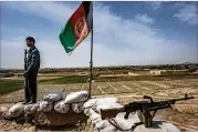  ?? NEWYORK TIMES ?? An Afghan policeman standswatc­h at his unit’s small hilltop outpost. After nearly 16 years ofwar, America’s longest, the Taliban in Afghanista­n are gaining ground and have evolved into amore tenacious foe.