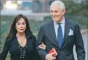  ?? Erik S. Lesser EPA/Shuttersto­ck ?? ROGER STONE and his wife, Nydia, arrive at court during his November 2019 trial in Washington.