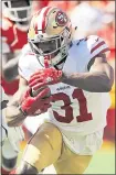  ?? CHARLIE RIEDEL — THE ASSOCIATED PRESS ?? Running back Raheem Mostert answered coach Kyle Shanahan’s challenge to seize the opportunit­y and improve ball security.