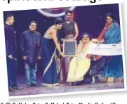  ??  ?? (L-R): Dr Akshay Batra, Dr Mukesh Batra, Mandira Bedi and Kim Sharma felicitati­ng the awardee Sai Kaustuv Dasgupta