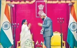  ??  ?? TMC supremo Mamata Banerjee with governor Jagdeep Dhankhar, after taking oath as the chief minister of West Bengal for a third consecutiv­e term, at Raj Bhavan on Wednesday.