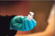  ?? Joseph Prezioso / AFP via Getty Images ?? The first batch of Moderna’s vaccine is seen at Hartford Hospital on Dec. 21.