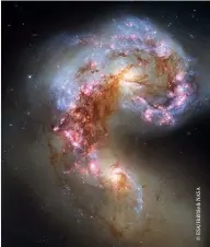  ??  ?? Below: The Antennae Galaxies, pictured here by the Hubble Space Telescope, are an excellent example of merging galaxies