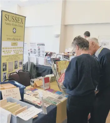  ?? ?? A picture of visitors and our stand at a local Family History Event that we organised by SFHG