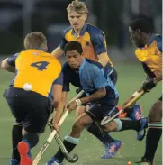  ??  ?? A STICKY SITUATION: Bishops’ Dayaan Cassiem is closed down by Rondebosch tacklers last night.