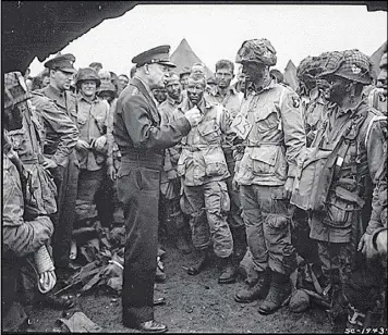  ?? CONTRIBUTE­D BY THE DEPARTMENT OF THE ARMY ?? Gen. Dwight D. Eisenhower meets with U.S. Army paratroope­rs from the 101st Division in England prior to the Normandy Invasion, which took place June 6, 1944.