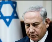  ?? AMIR COHEN/AP ?? Israeli Prime Minister Benjamin Netanyahu has been interviewe­d several times in two corruption cases.