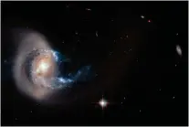  ?? ESA, NASA; ACKNOWLEDG­EMENT: A. GAL-YAM (WEIZMANN INSTITUTE OF SCIENCE) ?? BELOW: There isn’t a scale large enough to weigh galaxies like NGC 7714.