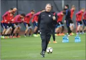  ??  ?? United States head coach Bruce Arena kicks a ball during Wednesday’s training session in preparatio­n for today’s mustwin World Cup qualifier against Honduras in San Jose.