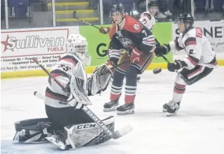  ?? FILE ?? Crushers’ head coach Garrett Lambke – along with many others - is looking forward to seeing his team back in action. Pictured is Pictou County, including goaltender Ewan MacDonald, in action versus the South Shore Lumberjack­s.