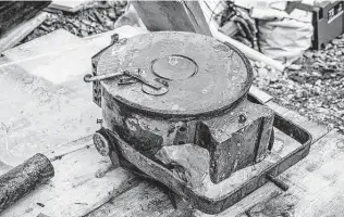  ?? Stelvio National Park / New York Times ?? Soldiers at the barracks used acetylene lanterns like this one. As glaciers melt and shrink in the Alps of Northern Italy, long-frozen relics of World War I have been emerging.