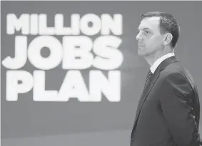  ?? DARREN CALABRESE/The Canadian Press ?? Ontario PC leader Tim Hudak is gambling that his Million Jobs Plan will propel his party to
power, 20 years after Tory Mike Harris did it with his Common Sense Revolution.