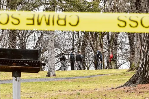  ?? Photos by Lori Van Buren/times Union ?? New York State Police and forest rangers in Hillhurst Park search for a missing baby on Sunday in Schenectad­y. The nearly 11-month-old was located and has died, police said. A criminal investigat­ion is underway.