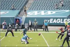  ?? CHRIS SZAGOLA – FOR THE ASSOCIATED PRESS ?? Eagles kicker Jake Elliott (4) kicks a field goal during the first half Sunday against the Cincinnati Bengals at Lincoln Financial Field. Elliott wouldn’t get the chance to kick one from 59 yards away near the end of overtime, another botched moment in a three-week-old season of mistakes for the Eagles.