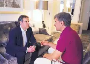  ?? ASSOCIATED PRESS ?? Michael Cohen, left, is interviewe­d by ABC’s George Stephanopo­ulos off camera in the New York hotel where President Trump’s longtime lawyer has been staying.