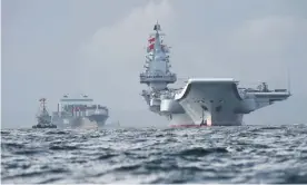  ??  ?? China’s first carrier, the three-decade-old, 66,000-tonne Liaoning, arrives in Hong Kong waters on 7 July 2017. Photograph: Anthony Wallace/AFP/Getty Images