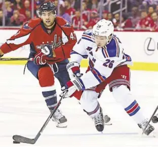  ?? AP ?? Ranger rookie Jimmy Vesey scores the tying and winning goals in Blueshirts’ victory over Capitals last night in D.C. and now has three for the season.