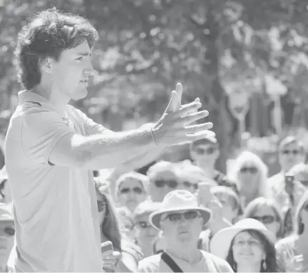  ?? Gary Nylander/the Canadian Press ?? Federal Liberal leader Justin Trudeau speaks to fans and supporters in Kelowna B.C. on his desire to legalize marijuana.