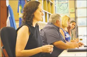  ?? Cassandra Day / Hearst Connecticu­t Media ?? Melissa Schlag is being vilified for calling Haddam “fascist and racist” at the end of Monday night’s selectmen meeting at the firehouse, where dozens protested her kneeling during the Pledge of Allegiance.