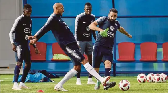  ?? EPA PIC ?? France players train at the Glebobets Stadium on Saturday, ahead of their semi-final match against Belgium tomorrow.