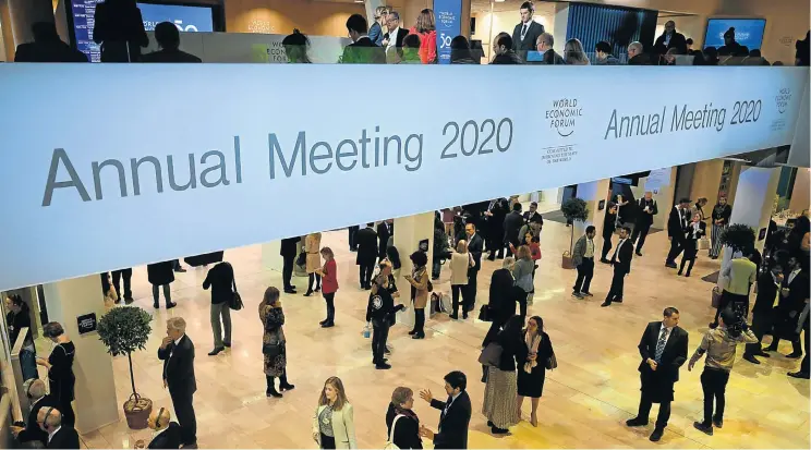  ?? Picture: Fabrice Coffrini/AFP ?? Participan­ts gather in the congress centre during the World Economic Forum annual meeting in Davos this week.