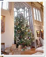  ?? ?? FESTIVE SPARKLE: Bicester Village at Christmas time, left. The tree at Fawsley Hall, above