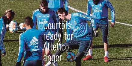  ??  ?? Thibaut Courtois (centre) in a training session with Real Madrid teammates.