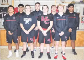  ?? RICK PECK/SPECIAL TO MCDONALD COUNTY PRESS ?? McDonald County High School honored senior members of the 2019-20 wrestling team on Dec. 12 at MCHS. The seniors are Eh Doh Say, Junior Teriek, Kaylee Eberley, William Mitchell, Jackie Grider, Jack Teague, Oscar Ortiz and McCoy Ikosia.