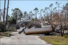  ?? CHRIS URSO/THE TAMPA BAY TIMES VIA AP ?? Destructio­n can be seen all over Mexico Beach Friday. Residents of the small beach town of Mexico Beach, Fla., began to make their way back to their homes some for the first time after Hurricane Michael made landfall Wednesday.