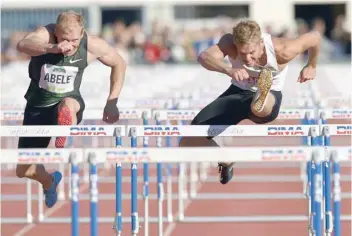  ?? — AFP ?? France’s athlete Kevin Mayer (R) competes in the men’s 110m hurdles race during the IAAF’S Decastar World Combined Events Challenge on September 16 in Talence, southweste­rn France.