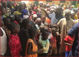  ??  ?? Children and women in an IDP camp at Kajuru