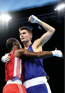  ??  ?? Campbell Somerville (right) after his win over Joshua Redhead.