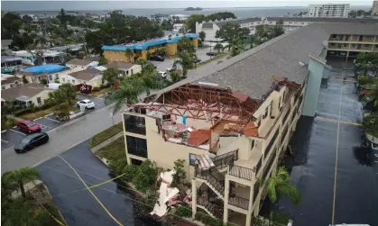  ?? ?? Tornado damage in Dunedin, Florida. No injuries were reported. Photograph: Max Chesnes/Tampa Bay Times/ZUMA Press/Shuttersto­ck