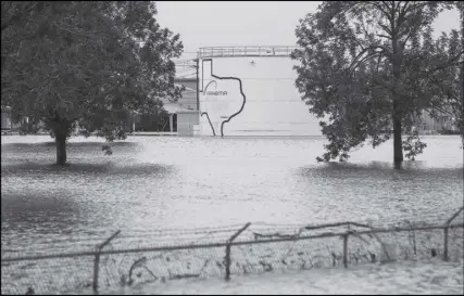  ?? HOUSTON CHRONIClE vIA AP ?? The Arkema Inc. chemical plant is shown Wednesday in Crosby, Texas. The plant about 40 kilometres northeast of Houston lost power and its backup generators amid Tropical Storm Harvey’s days-long deluge, leaving it without refrigerat­ion for chemicals...