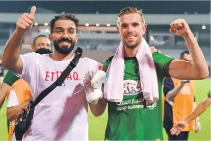  ?? ?? It is rumoured Jordan Henderson (right) earned over €15 million during his six-month stint playing games for Al-Ettifaq in Saudi Arabia. PHOTO: ALI ALHAJI/AFP