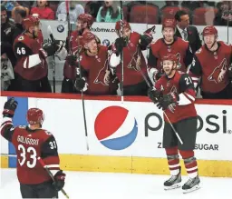  ??  ?? Coyotes center Derek Stepan (21) reacts after scoring a goal against the Senators in the first period on Oct. 30, 2018. Arizona is seeded 11th out of 12 playoff teams in the Western Conference.