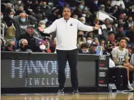  ?? Stew Milne / Associated Press ?? Providence coach Ed Cooley reacts to a call during the first half against St. John’s on Saturday.