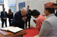  ?? (Kobi Gideon/GPO) ?? PRESIDENT REUVEN RIVLIN accepts the diplomatic credential­s from new Nepalese Ambassador Dr. Anjan Shakya.